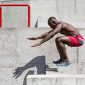 The fit athlete doing exercises at stadium. Afro or african american man outdoor at city. The jumping sport exercises. fitness, health, lifestyle concept